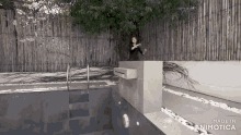 a woman is standing in front of a swimming pool made in animatica