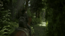 a man riding a horse in a video game with a sign that says " fragile "