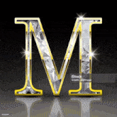 the letter m is made out of diamonds and gold