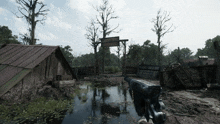 a person holding a gun in front of a sign that says ' swamp ' on it