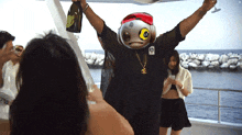 a man wearing a mask holds a bottle of champagne in his hand