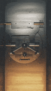 a metal safe with a round door and a round lock