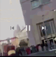 a blurry picture of a building with the letters k and i on the bottom