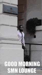 a man carrying a suitcase is standing in front of a building that says good morning smn lounge