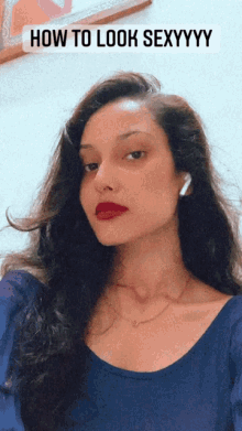 a woman taking a selfie with the words how to look sexyyyy