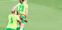 a soccer player wearing a number 10 jersey hugging another player