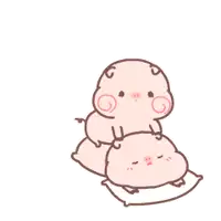 a couple of pigs laying on top of each other on a white pillow .