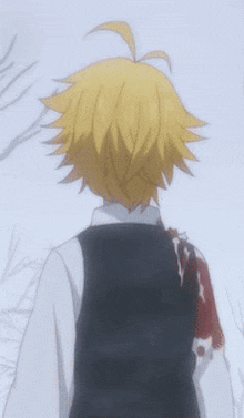a close up of a person 's back with a bloody arm