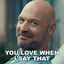 a bald man with a beard is smiling and saying you love when i say that
