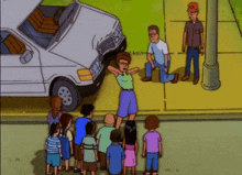 a group of people are standing on a sidewalk in front of a white van that has a broken wheel