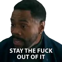 a man with a beard and earrings says stay the fuck out of it