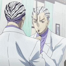 a man in a white coat is looking at himself in the mirror