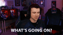 a man wearing headphones says what 's going on .