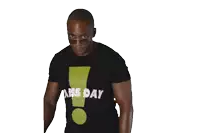 a man wearing a shirt that says ams day covering his nose