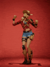 a woman in a cowboy hat and shorts is dancing