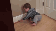 baby shocked surprised scared door stopper
