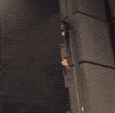 a shirtless man is giving a thumbs up
