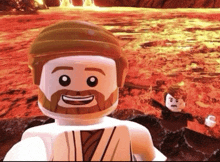 a lego man with a beard is smiling in front of a lava field