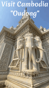a statue of three elephants on the side of a building with the words visit cambodia " oudong " above it