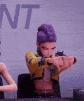 a girl with purple hair is sitting at a table in front of a wall that says nt