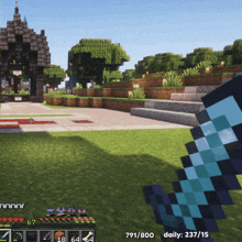 a screenshot of a minecraft game shows a diamond sword in the foreground