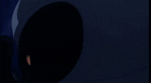 a man in white pants is standing next to a black object