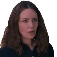 a close up of a woman 's face with long brown hair