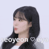 a close up of a woman 's face with the words seoyeon eya written on the bottom