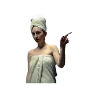 a woman with a towel wrapped around her head is pointing