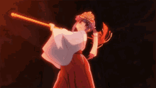 a girl with purple hair is holding a sword in her hands