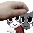 a person is petting a cartoon cat with a scarf around its neck .