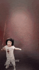a little girl is dancing in front of a red background with the words custom text written on it