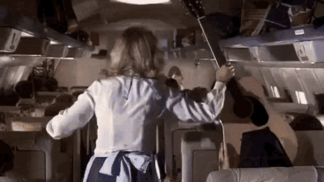 Airplane Guitar GIF - Airplane Guitar Ouch - Discover & Share GIFs