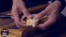 Splitting The Bread A Knead To Bake GIF - Splitting The Bread A Knead To Bake Split In Half GIFs