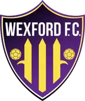 a purple and yellow shield with the words wexford f.c. on it