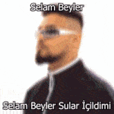 a blurry picture of a man wearing glasses and the words selam beyler