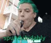 a man with green hair is smoking a cigarette and the words spindubidably are visible