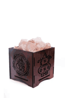 a wooden box with a drawing of a pineapple and a swastika on it