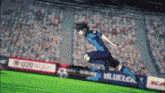a soccer player in a blue uniform is kicking a soccer ball