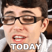a man wearing glasses is making a funny face and the word today is on his face