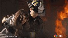Save From The Fire Chicago Fire GIF - Save From The Fire Chicago Fire Getting Out Of A Burning Building GIFs