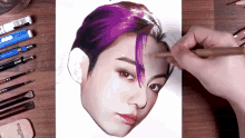 a person is drawing a woman 's face with purple hair and a faber castell eraser