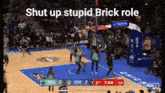 a basketball game is being played with the words shut up stupid brick role on the bottom