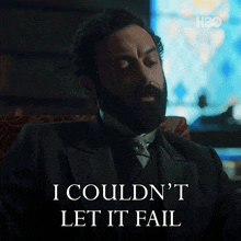 a man in a suit and tie says " i couldn 't let it fail "