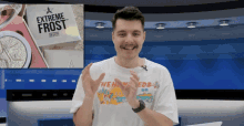 a man wearing a shirt that says extreme frost