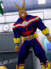 all might from my hero academia is standing in a classroom in front of a blackboard .