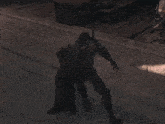 a shadow of a person is cast on the ground in a video game