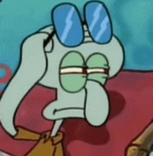 squidward from spongebob squarepants is wearing sunglasses on his face .