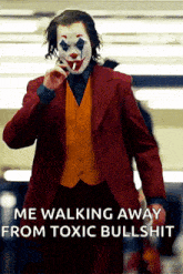 a man in a clown costume is walking away from a toxic bullshit