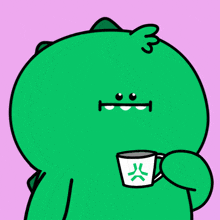 a cartoon drawing of a green monster holding a white cup with a green star on it